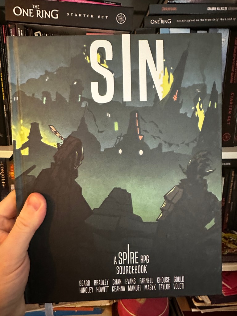 The Cover of Sin showing two drow looking out over a dark city in flames.