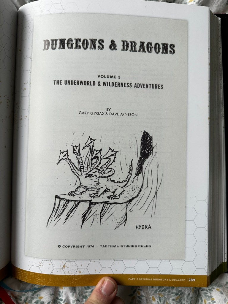 OD&D Volume 3, The Underworld & Wilderness Adventures. Its a got a line drawing of a hydra on the cover.