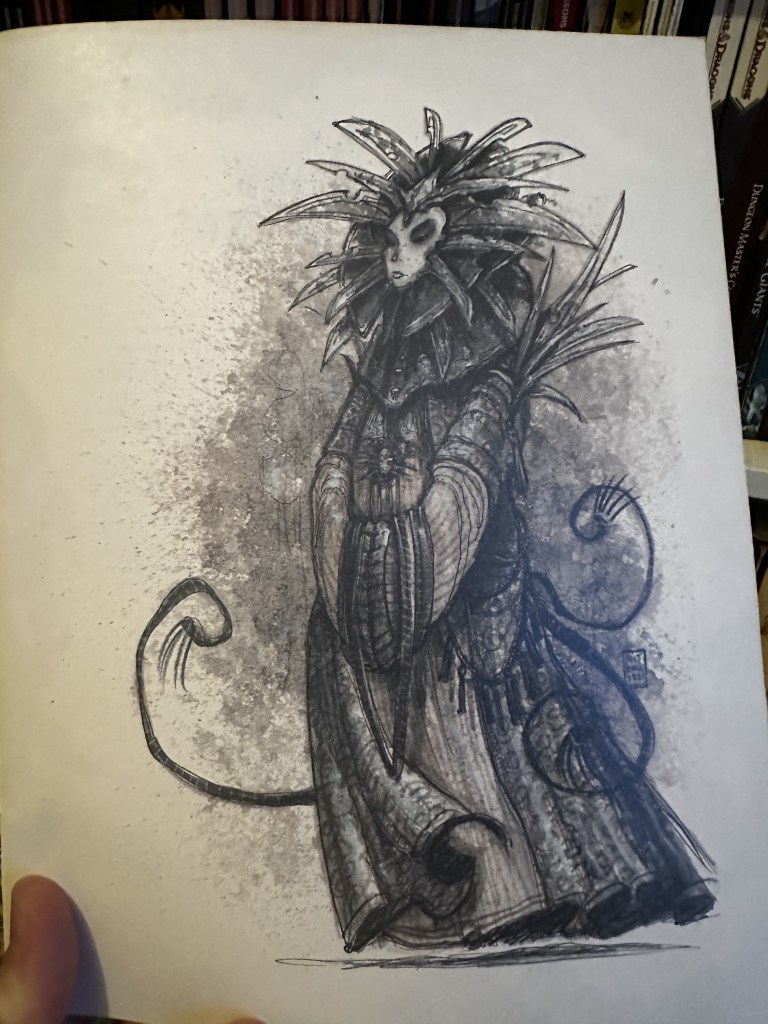 The Lady of Pain - line drawing. The masked woman stands on her own in long robes with blades ringing her face.