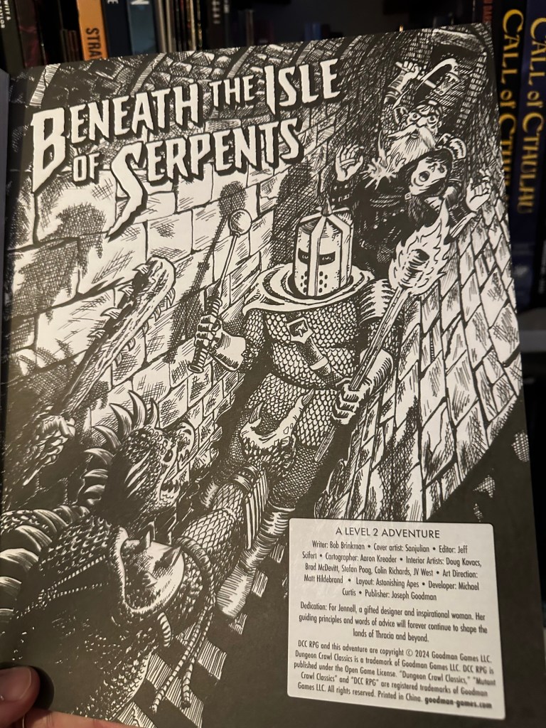 Beneath the Isle of Serpents inside cover illustration shows a band of adventurers filing down a narrow corridor with a warrior in front, a Wizard in the middle and a hypnotised Dwarf in the rear, attacking the Wizard. They are being attacked by a Serpent man who looks a lot like a Lizard man if I'm being honest about it.