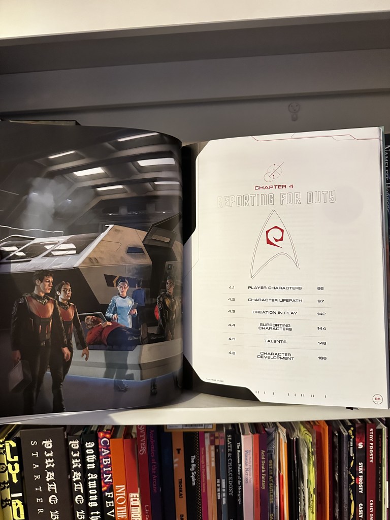 Reporting For Duty Chapter two-page spread.  Illustration of a number of crewmembers escorting an injured crewmember on a gurney through a shuttle bay.