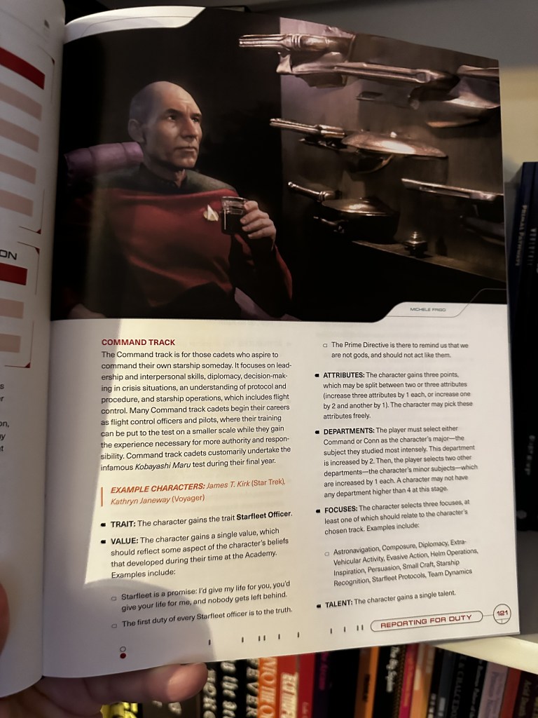 Captain Picard overseas the Command Track.